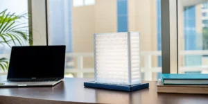 A managed firewall device on a desk, a key factor in managed firewall pricing.